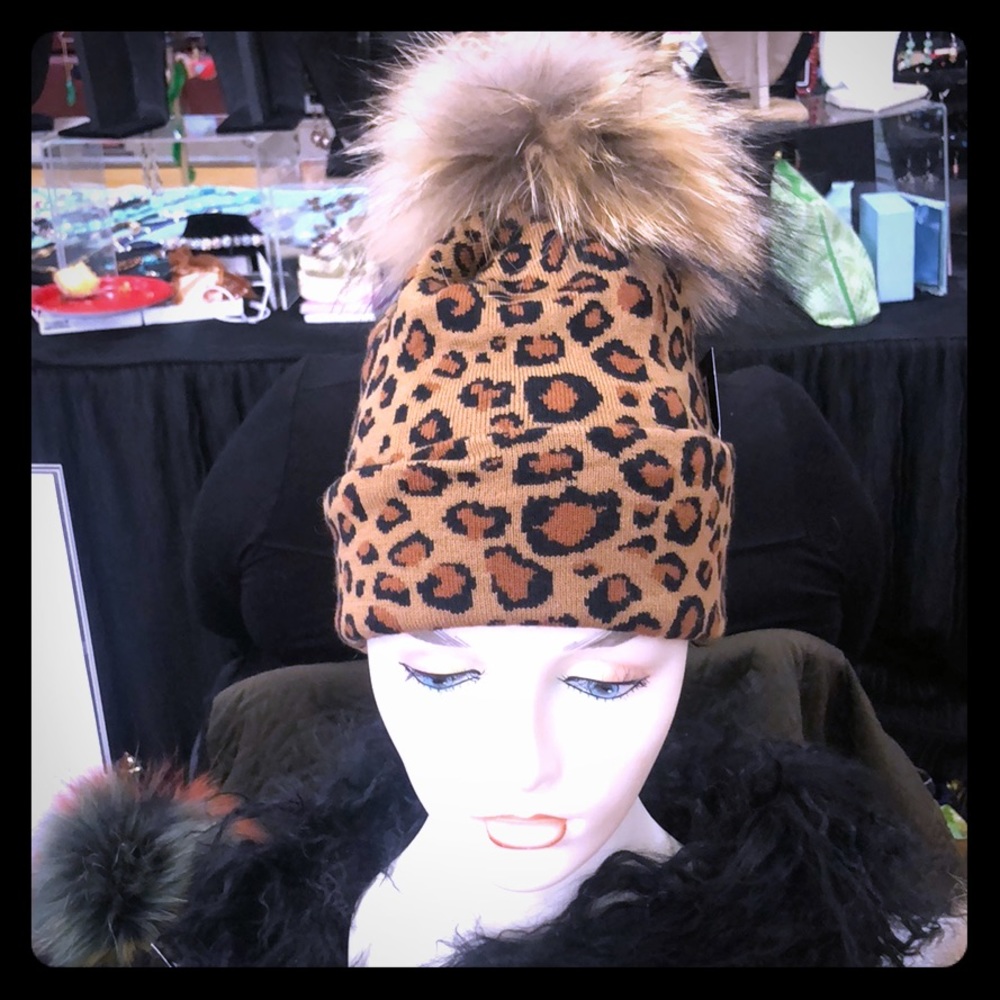Leopard hat with raccoon pompom